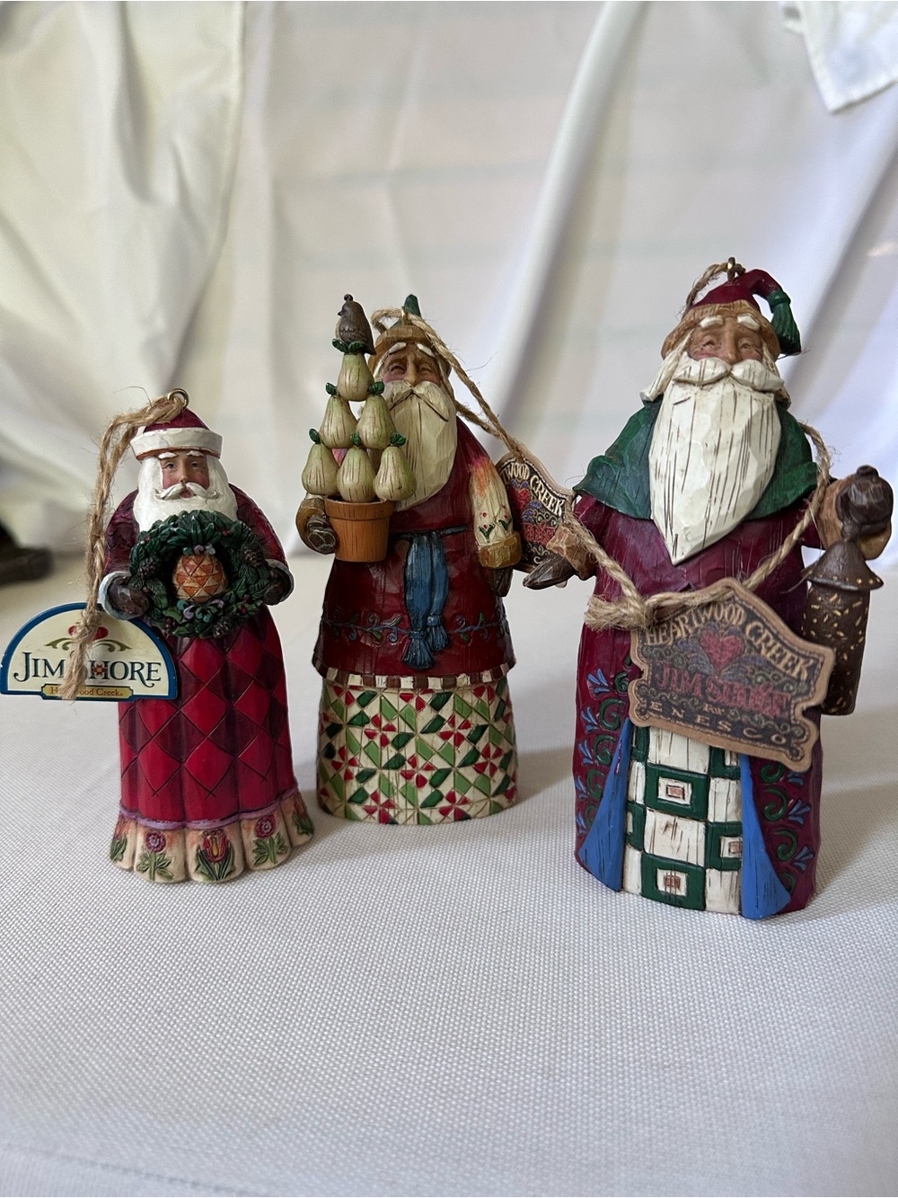 Three Jim Shore Santa Ornaments